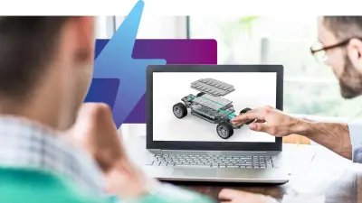 Two developers infront of a laptop