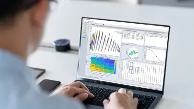 Man operates application on laptop