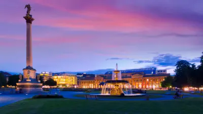 Stuttgart Schlossplatz at sunset with Jubilee Column and fountain