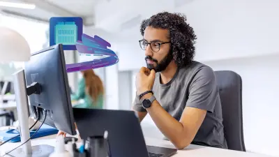 The image depicts two colleagues discussing about cybersecurity compliance and standards