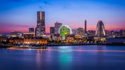 Night view of Minato Mirai, Yokohama, with illuminated Ferris wheel and Landmark Tower