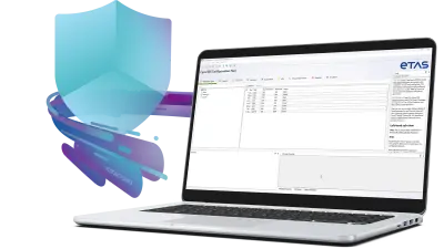 Woman sitting at a desk with a laptop with ETAS CycurIDS software configuration